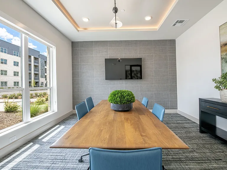 Elevate your work-life balance in the stylish conference room at Sage at Celina Residences. With modern design and ample natural light, this space is perfect for collaboration and creativity. Schedule a visit today to see it for yourself!