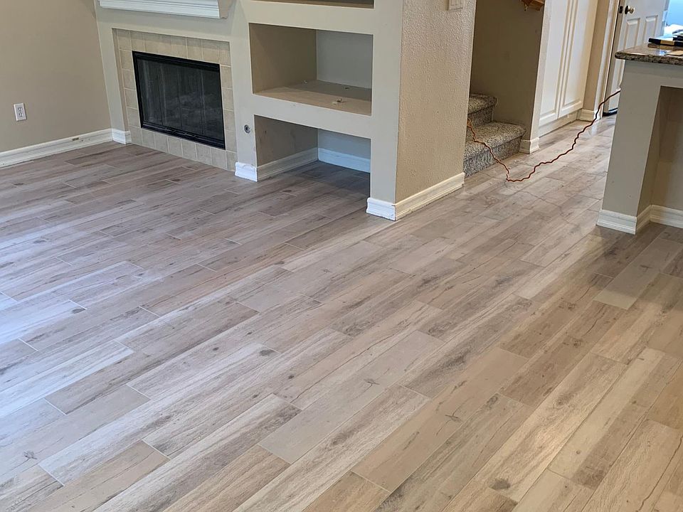 View from front door into living/dining areas. New flooring installed August 2022