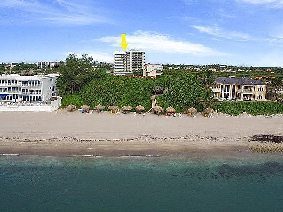 Private Beach with Tiki Huts