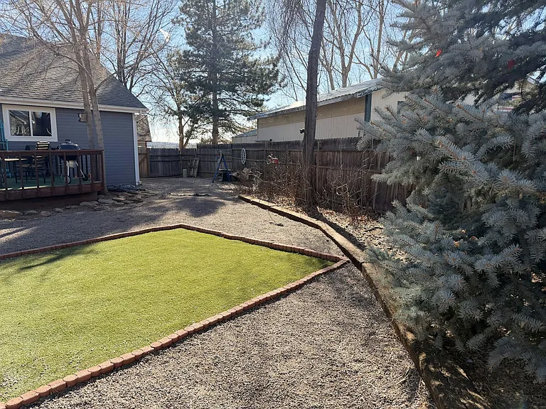 Huge back yard with turf