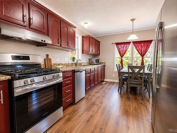 4th image of 6950 E 77th Avenue