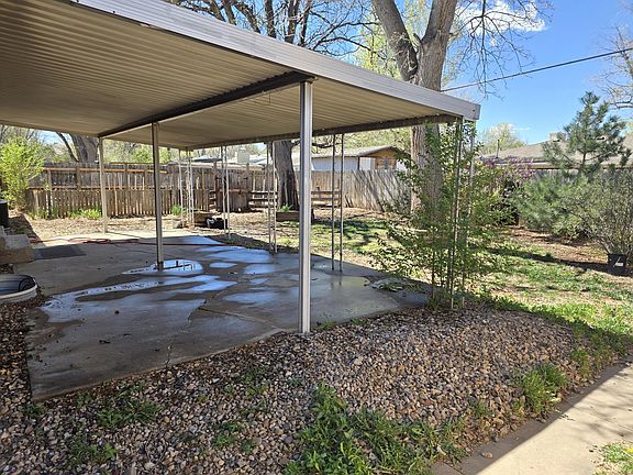 Yard with Covered Patio and Shed