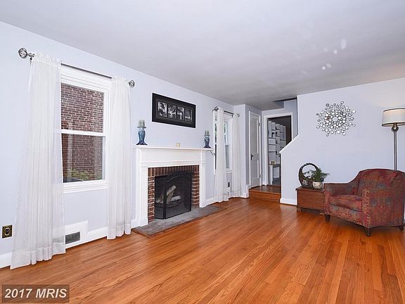 LR offers wood burning fireplace and mantle