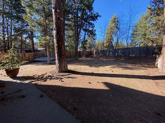 This is not a park . . .it's your backyard!! Enjoy your barbecues and hamock. There's plenty of space for your firepit, toys, patio furniture and barbecue. And its dog proof!