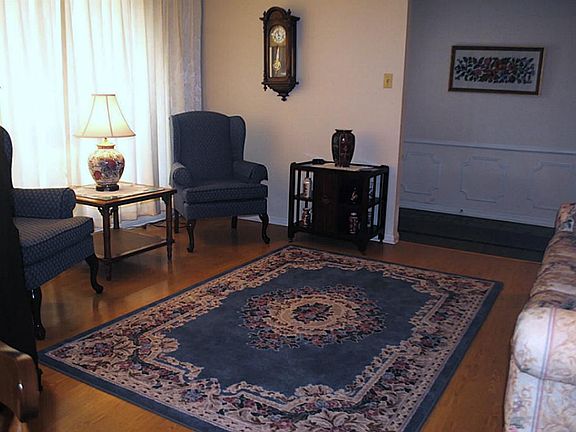 What fun you will have entertaining your special guests in the formal living room, directly off the entry.  Large windows for lots of light.