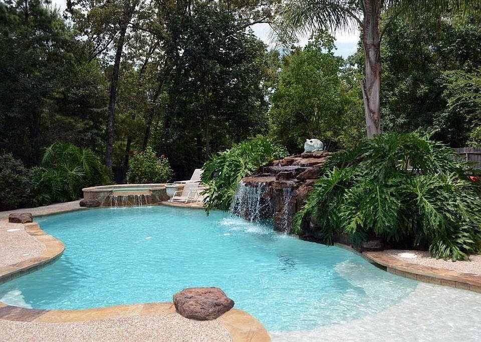 Heated pool and spa with grotto and remote control.
