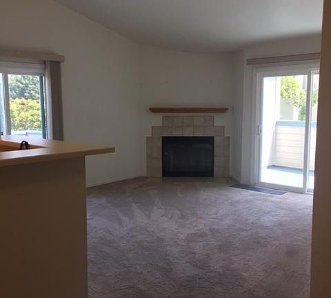 Living room with wood fireplace