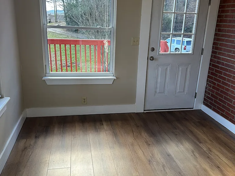 Main entrance. Living area to rights.