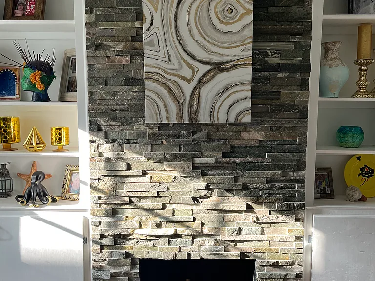 Stone Faux Fireplace and Built in Shelving
