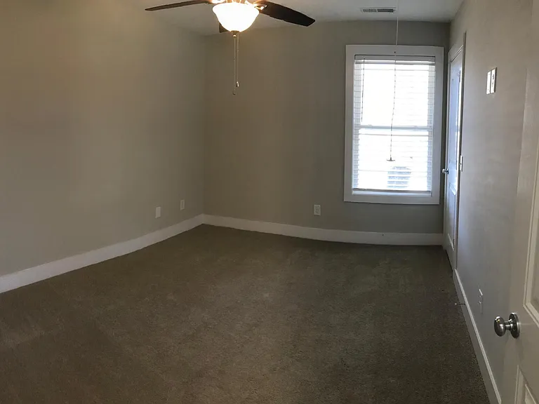 3rd bedroom with closet and attic access for storage
