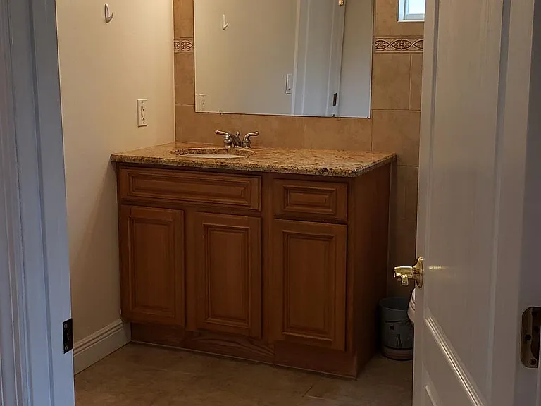 Downstairs third full large bath