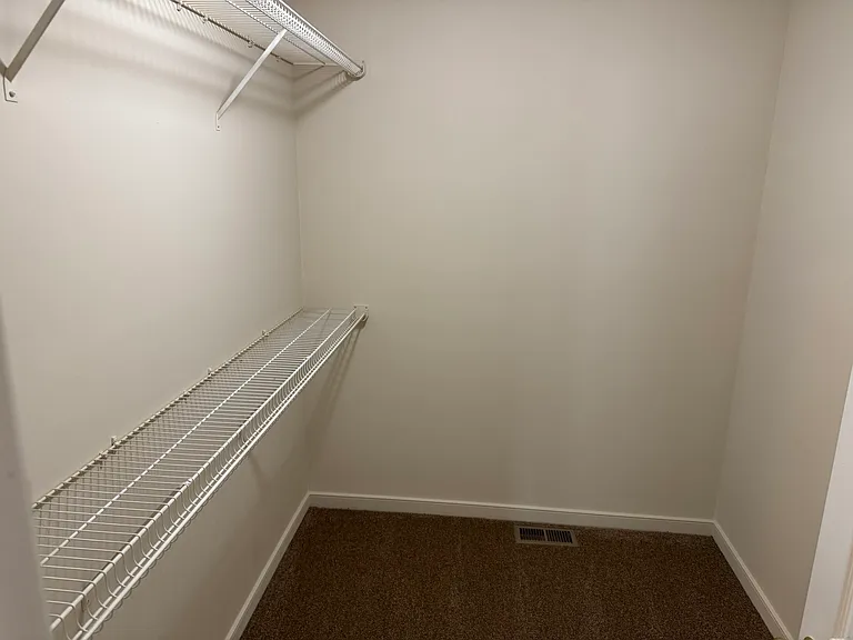 Primary Bedroom Walk-In Closet