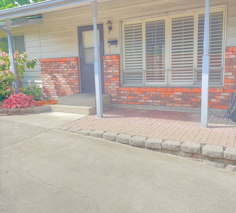 Front door with covered patio