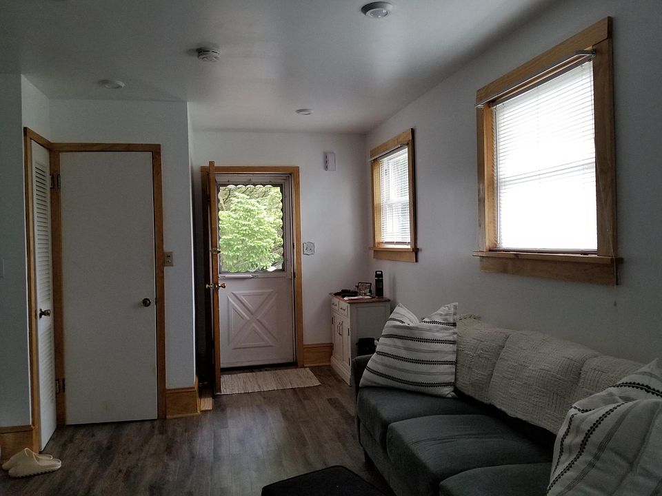 Entrance into Apartment. Living Room with closets.