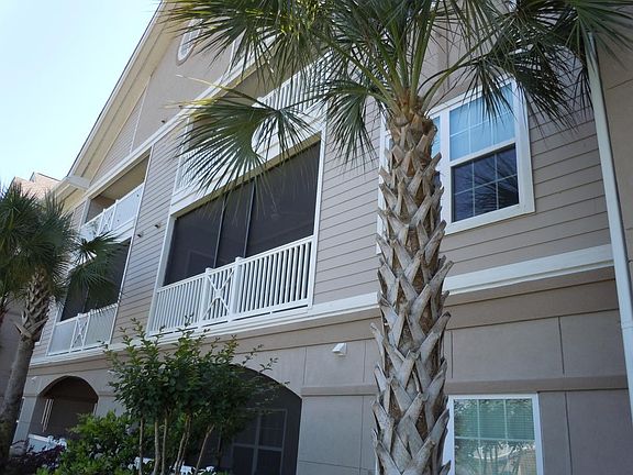 Screened patio facing lagoon