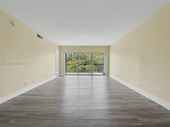 2nd image of 3250 N Palm Aire Dr APT 406