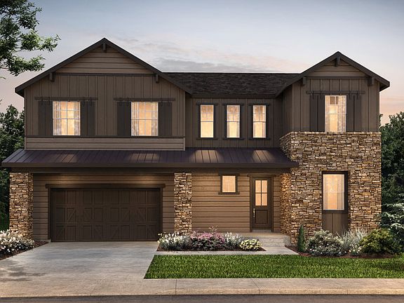 Two-story Rodeo plan shown in Elevation C with a three-car garage and stunning accents.