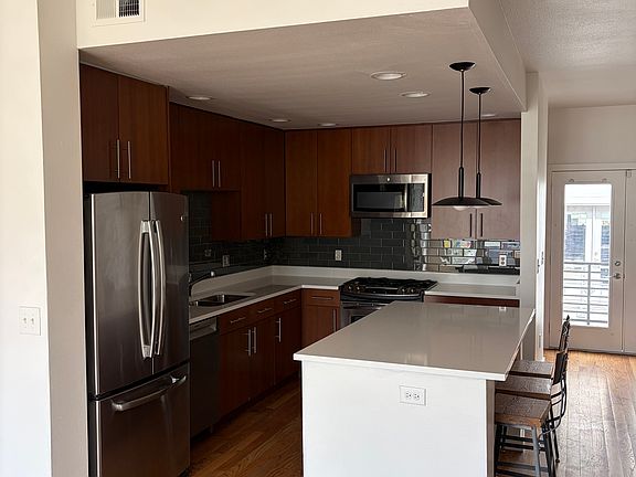 2nd image of 3400 Larimer St Unit 107