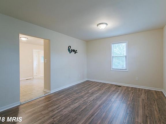 Living Room with view into Kitchen