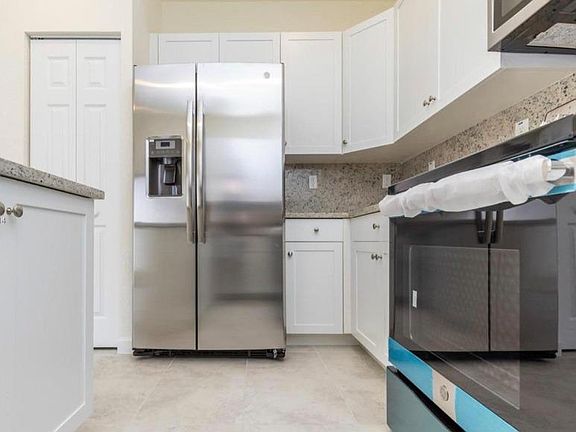 4th image of 10575 W 33rd Way Unit 10575
