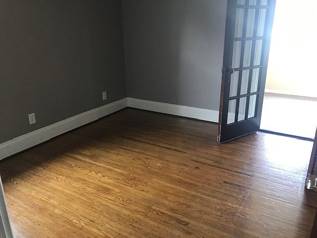 Bedroom #3 - French doors lead to covered porch off bedroom.