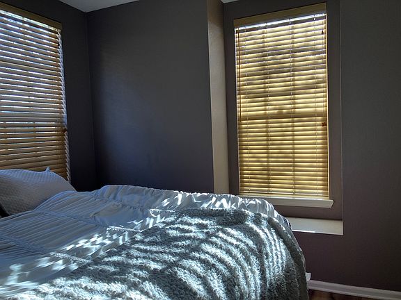 Primary bedroom features plenty of light