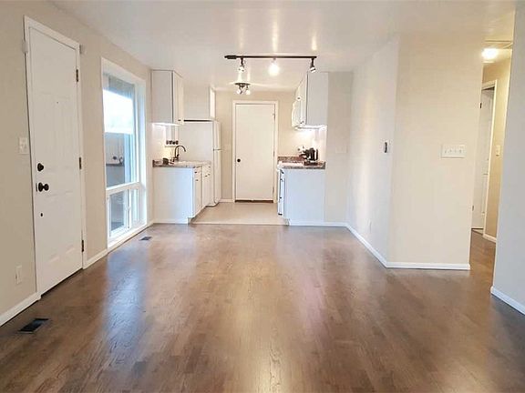 View from the living room. Plenty of space for a dining room seating area.