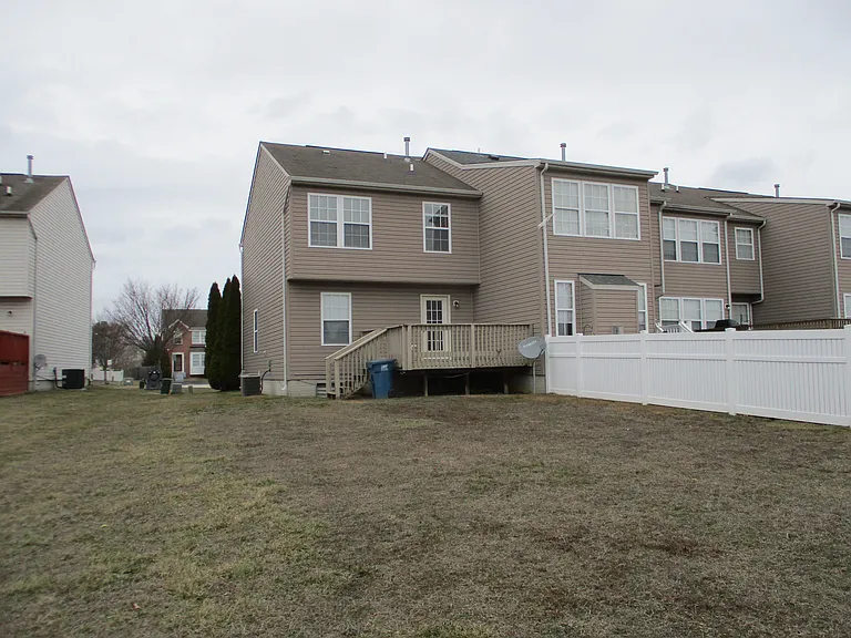 View of back yard and deck