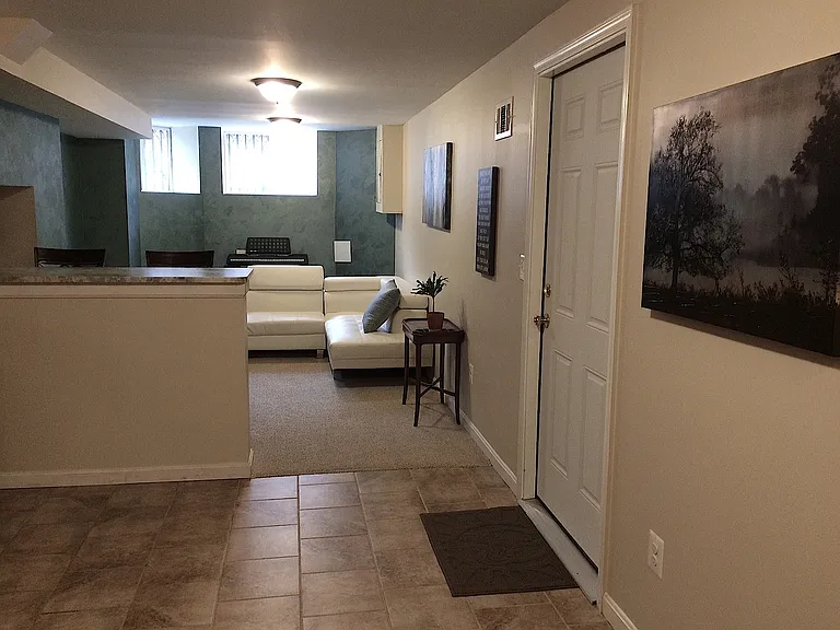 Kitchen/living room facing front of building.