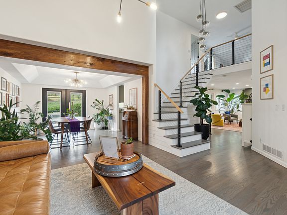 Second living area on main floor with with vaulted ceilings