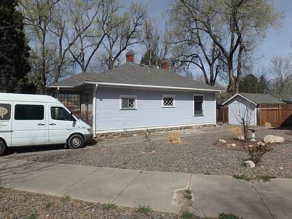 Side view of house and 1 car garage