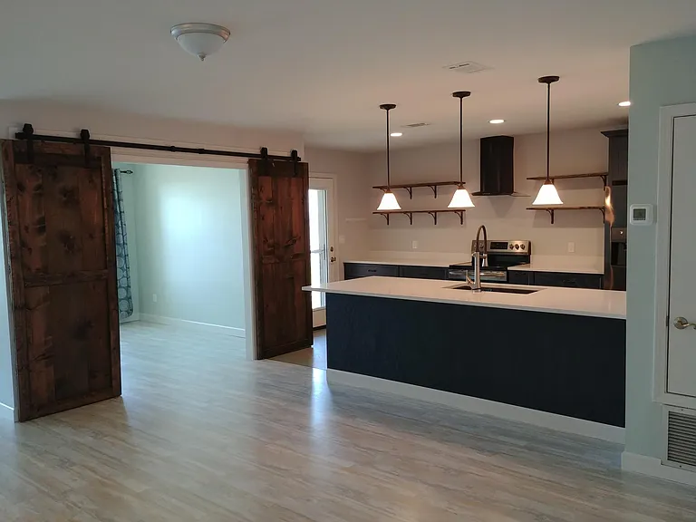 Dining area looking into kitchen and study