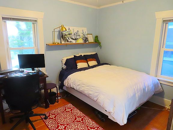 First bedroom on top floor for privacy with two windows for natural light.