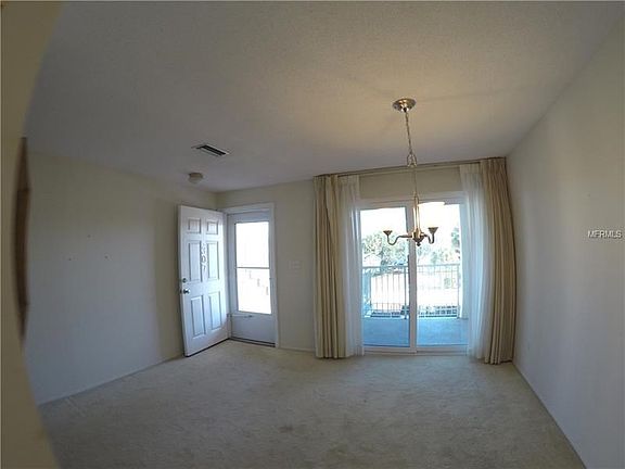 Review of entrance and dining room from kitchen