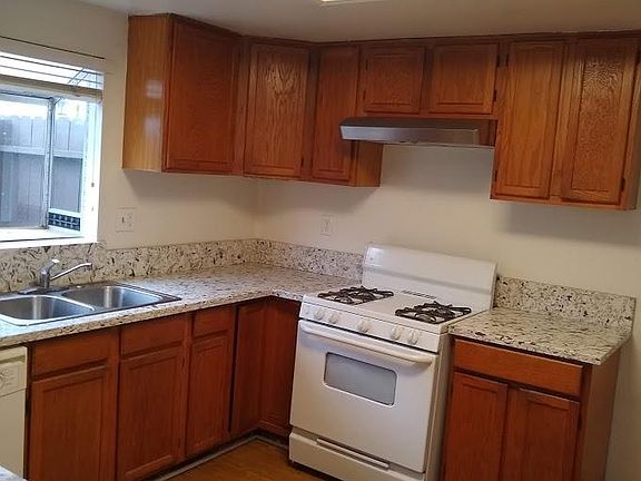 Kitchen with gas stove.