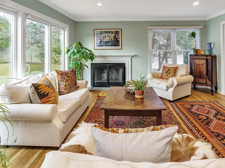 Living Room with wood burning fireplace. Faces great lawn of Westhampton Beach