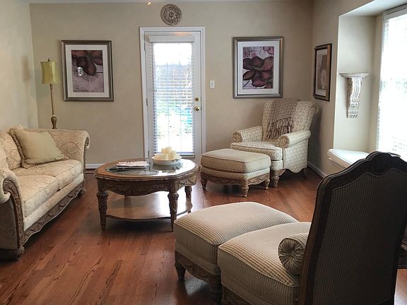 Living room door leads to side garden.