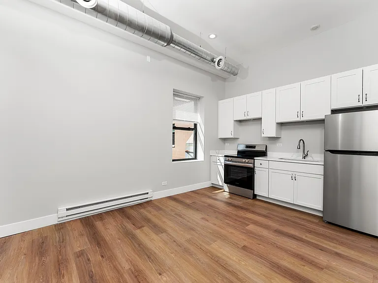 1219 W Devon Ave #203 — Photo 4