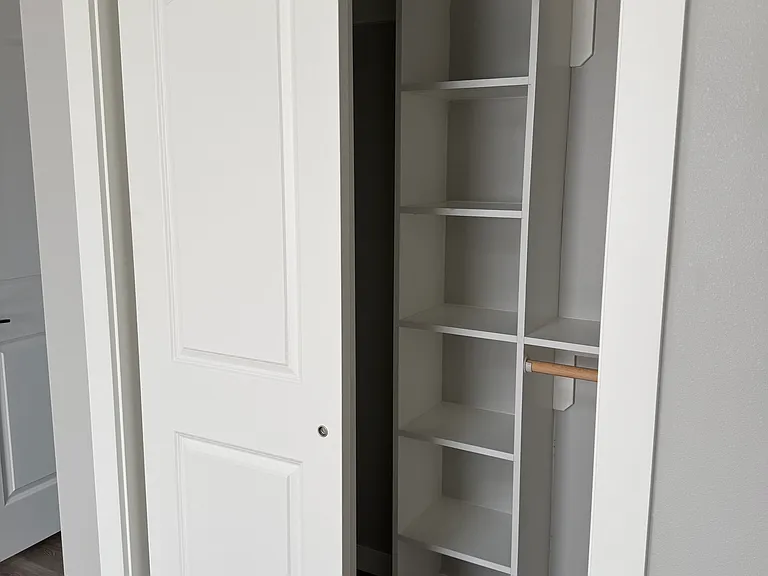 Full closet with built in shelving