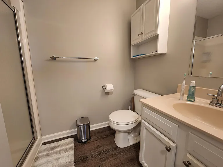 Master full bathroom with glass stand-up shower
