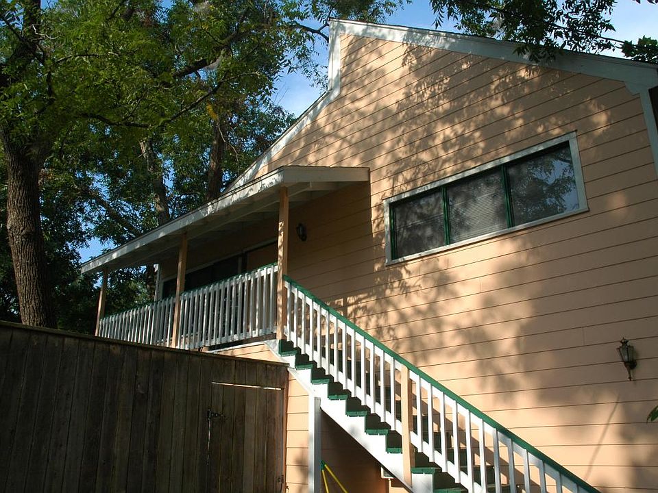 Exterior view of the apartment building, looking at the stai