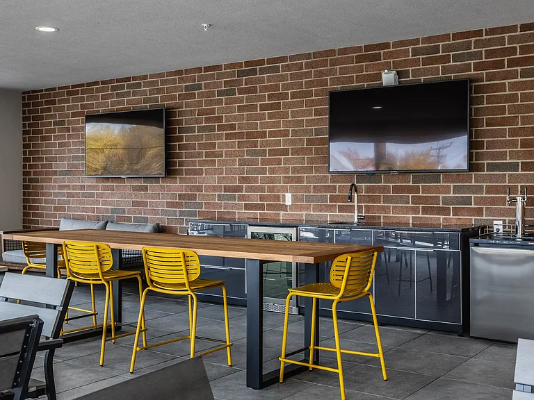 Private Sky Lounge Complete with Outdoor TVs and Kitchen Area
