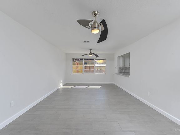 5th image of 2474 Moore Haven Dr E