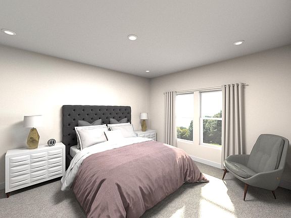 Relax and unwind in the luxurious primary suite.