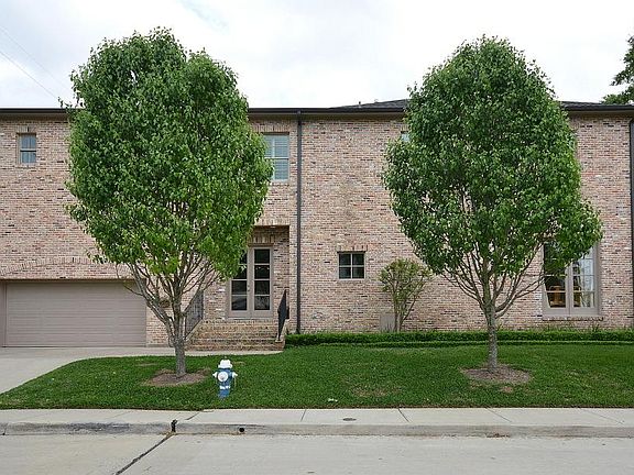 Side street leading to garage is a cul-de-sac. Perfect area for kids to ride bikes and play ball
