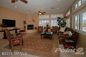 Family Room w/Fireplace & Views of Mtns.