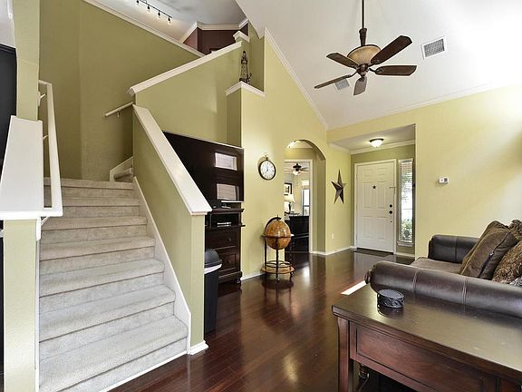 Living room with high ceilings and lots of natural light