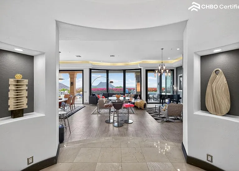 Mountain views & sculpture niches greet you at the door