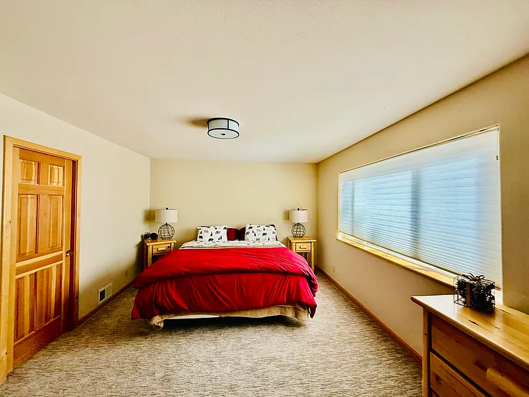 Upstairs king bedroom with direct access to bathroom through pocket door