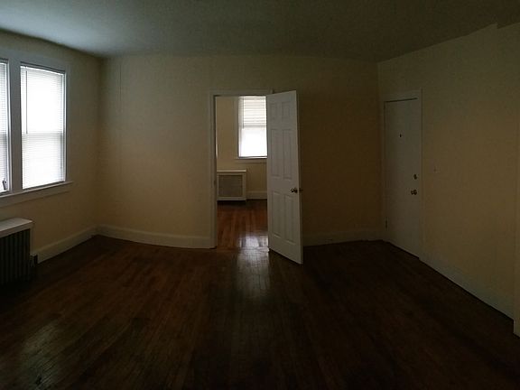 LIVING ROOM WITH VIEW OF SECOND BEDROOM